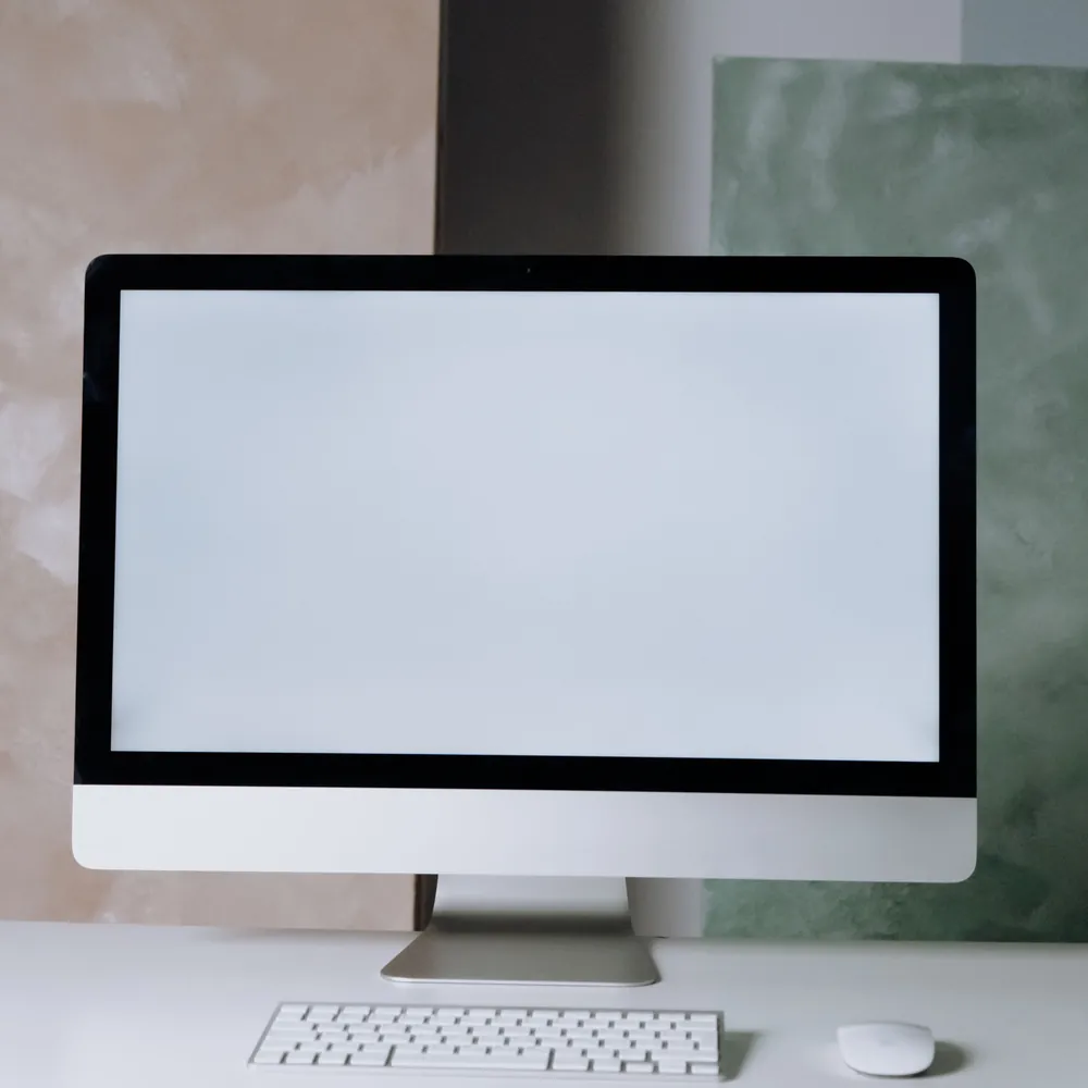 A desktop computer on a white desk