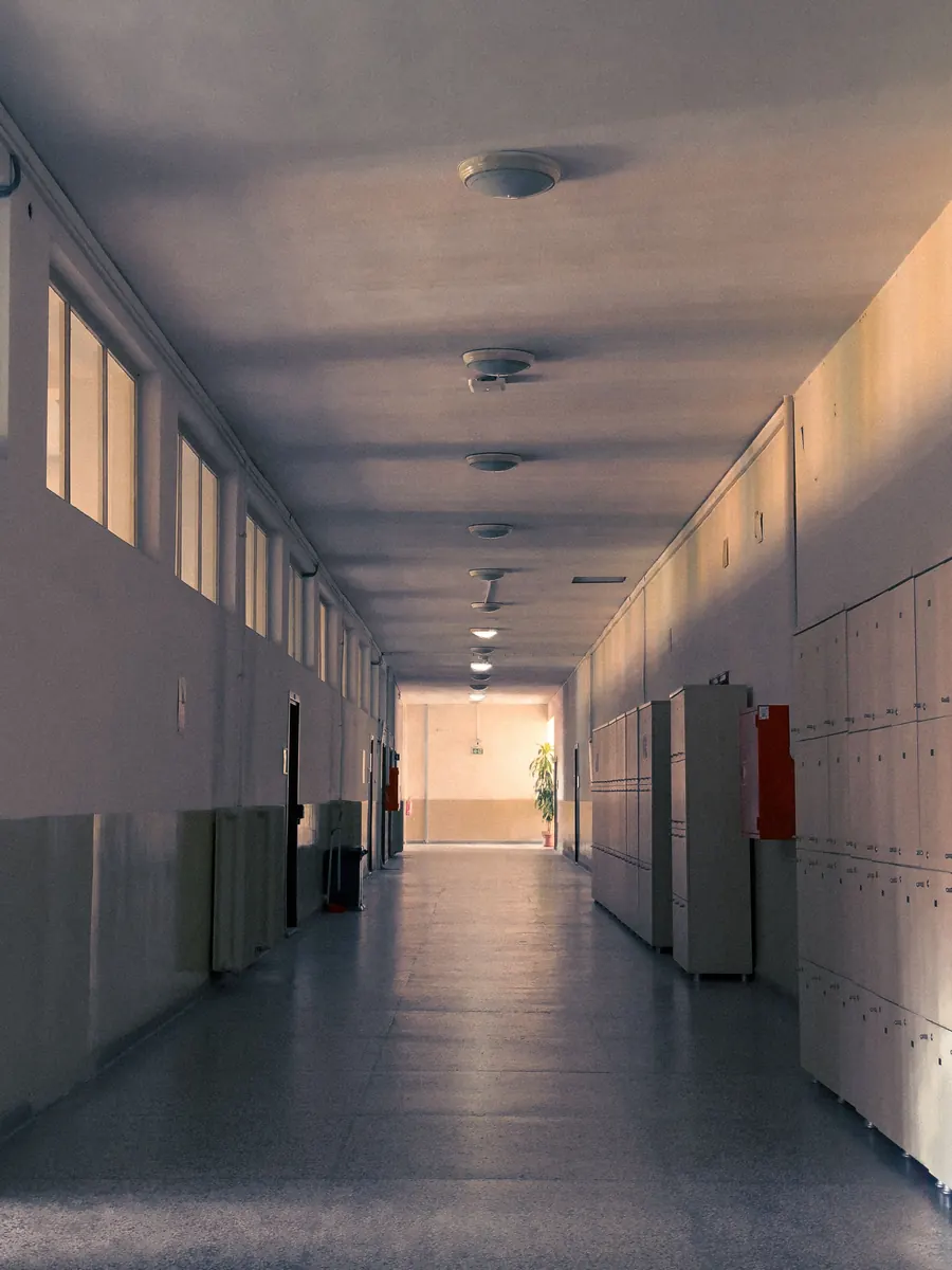 Empty school corridor with lockers